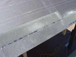 First course of asphalt roof shingles lined up with the starter course First course of asphalt roof shingles lined up with the starter course